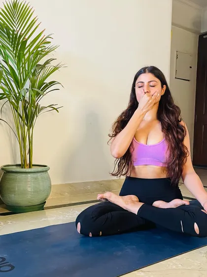 The power of breath is central to yoga. Here I am practicing Nadi Shodhana, or alternate nostril breathing, a pranayama technique that calms the nervous system, reduces anxiety, and balances the left and right hemispheres of the brain.