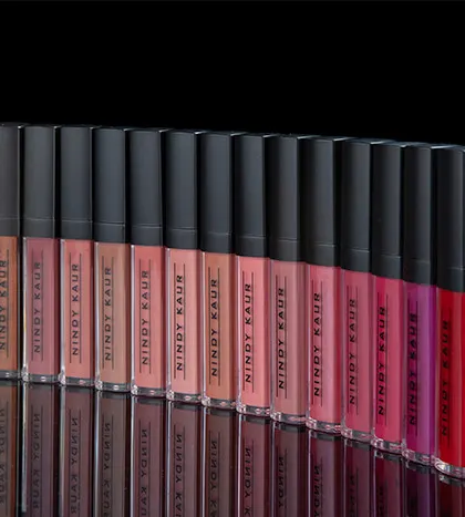 For e-commerce, we create clean, uniform shots that showcase your entire product line, like this lineup of liquid lipsticks, ensuring color accuracy and a professional look for online stores.