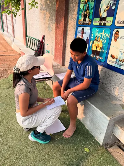 A one-on-one consultation with a young player to discuss his physical development and fitness goals. We believe in a personalized approach to coaching.