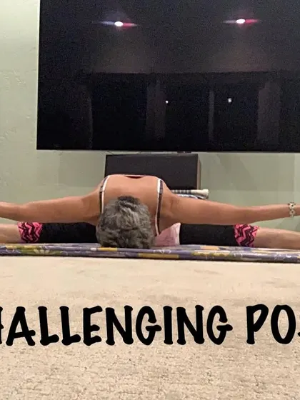 Here I am holding a challenging split pose, showing the strength and openness that comes from a regular yoga practice.