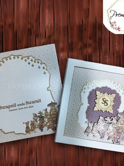This premium box invitation features a 3D Baraat scene, creating a stunning visual effect. It's a perfect choice for a grand, royal wedding.