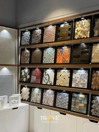 This display of mosaic tiles in my showroom showcases the stunning variety of textures, shapes, and metallic finishes I offer. It’s a perfect example of the style and sophistication you can explore here.