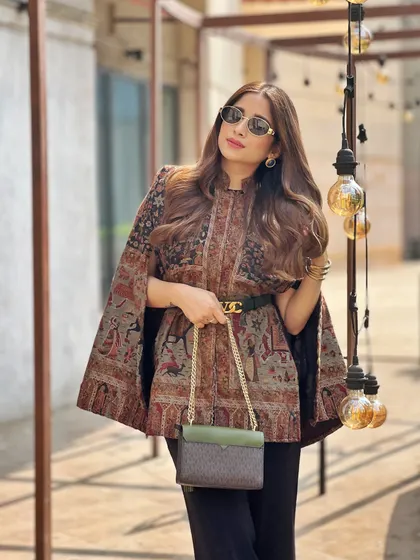 I have a deep appreciation for Indian craftsmanship. This beautiful cape jacket, which I found from a local artisan in Kashmir, is a piece I will treasure forever.