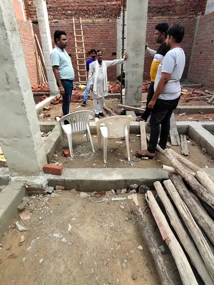 Another angle of the residential construction site, showing the plinth beams and columns that form the skeleton of the house.