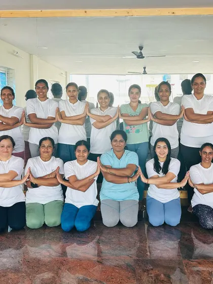 The group poses together after completing 108 Sun Salutations for Rathasapthami. Their dedication and energy were incredible.