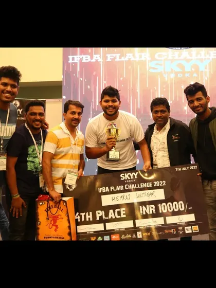 The full team celebrating our bartender's win at the IFBA Flair Challenge, a moment of collective pride.