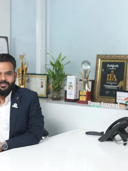 A portrait of me in my office, ready to discuss and plan your dream pre-wedding shoot.