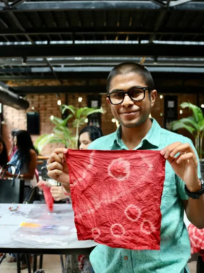 This participant created a lovely napkin with soft, circular patterns. The smiles on everyone's faces are the best part of any workshop.