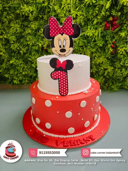 A cute Minnie Mouse cake for a first birthday. The red and white polka dot design is iconic and perfect for a little one's special milestone.