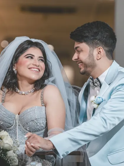 A beautiful, happy portrait of a couple during their Christian wedding ceremony. The genuine smile and loving gaze say it all.