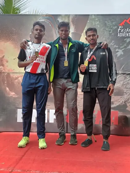 On the podium with fellow finishers. The sense of accomplishment after a tough mountain run is incredible.