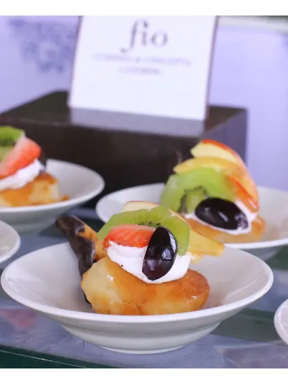 A close-up of a fruit-topped dessert canapé, showing the delicate and artistic presentation of our sweet bites.