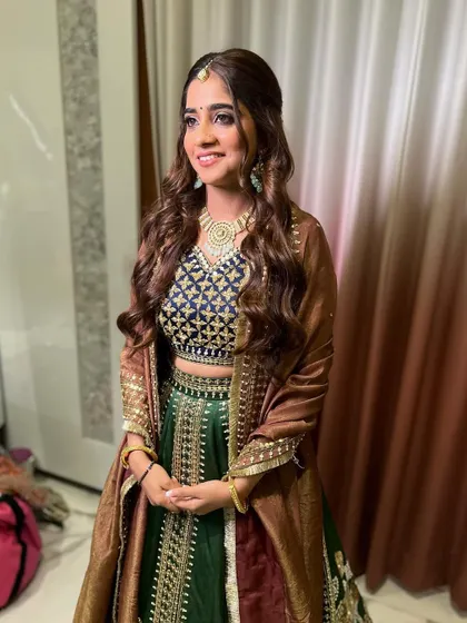 A portrait of Tulsi for her pre wedding function. We accentuated her stunning features with a soft glam look.