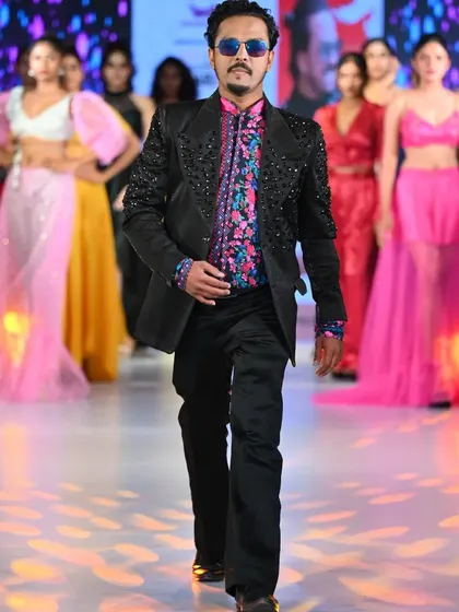 Taking the final walk as the show director at the Fashion Runway of India event. I am hands-on from the initial concept to the final bow, leading a talented team of models and crew to deliver a flawless production.