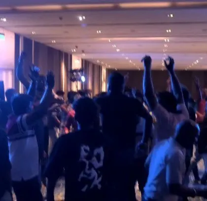 The crowd at the ABB party, fully engaged and enjoying the music.