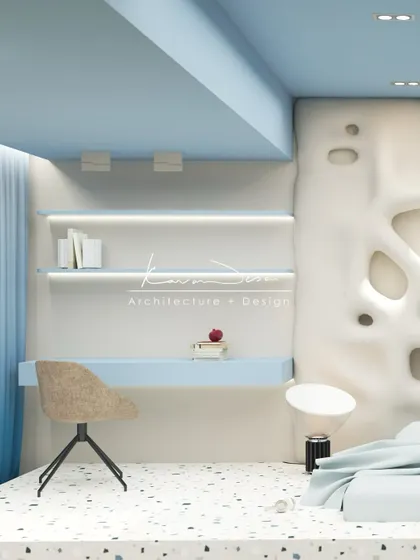 This kids' room blends soft whites and sky blue to create a calming, inspiring space. The focal point is the custom-molded wall with organic, cave-like openings that double as shelves, sparking imagination.