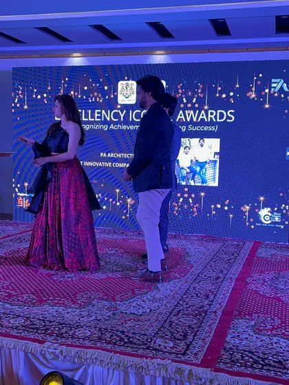 On stage at the Excellency Iconic Awards.