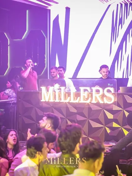 The view from the side of the stage at Millers, showing a full house ready for a big night of house and techno music.