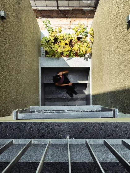 We find opportunities for delight in unexpected places. Here, we designed a small, built-in bench at a lower level, creating a quiet nook for residents to pause and enjoy a moment of calm amidst the urban environment.