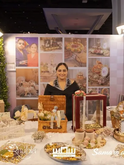 Posing with some of my favorite hampers at the WOW Awards. You can see a variety of styles, from rustic picnic baskets to elegant velvet boxes.
