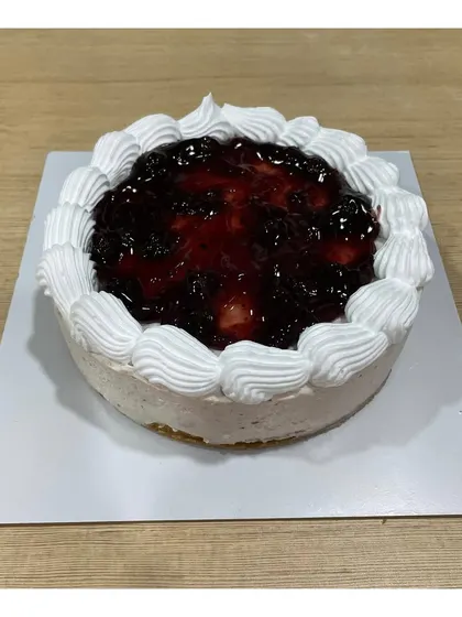 This is my classic no-bake blueberry cheesecake. It’s light, creamy, and topped with a generous layer of homemade blueberry compote, all on a crunchy biscuit base. It's one of my most popular flavours for a reason.
