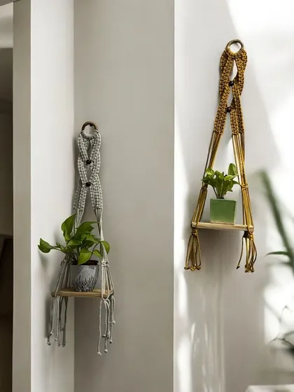 My wall planter shelves are perfect for adding greenery to your walls. Here you can see two different styles, one with a simple knotted design and another with a more intricate pattern, showing the range of customization available.