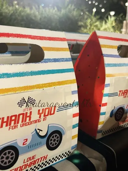 "Thank You for Vrooming In!" These custom-designed party favor bags are from a race car-themed second birthday, a perfect parting gift for the little guests.