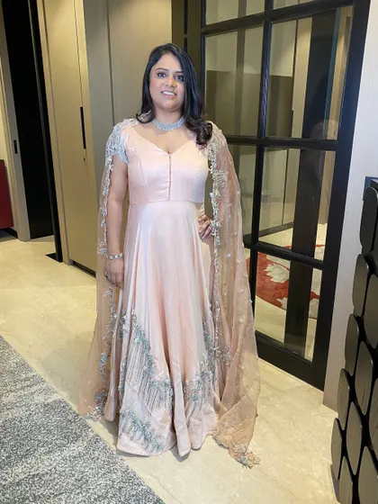 The final look for the housewarming. She looks absolutely gorgeous in her pastel gown, with makeup that is both glamorous and graceful.