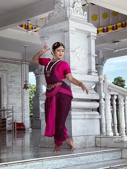 A graceful pose on the steps of a marble temple in Uttarakhand. The serene environment provided a beautiful contrast to the dynamic energy of the dance.