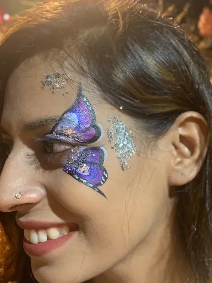 A beautiful double butterfly design in shades of purple with glitter.