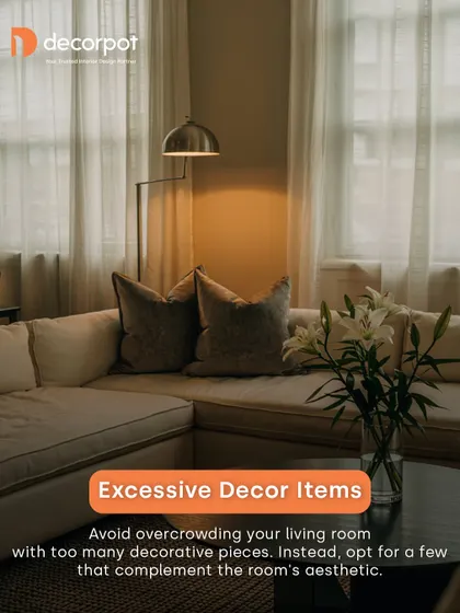 Too many decorative items can overcrowd a living room. My advice is to choose a few key pieces that complement the room's aesthetic for a more curated and minimalist look.