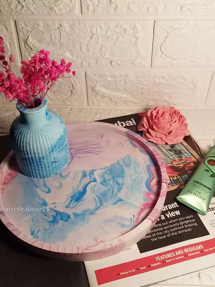 Our XL marble tray styled with a matching vase and other decor items. It’s large enough to serve as a beautiful base for a vignette.