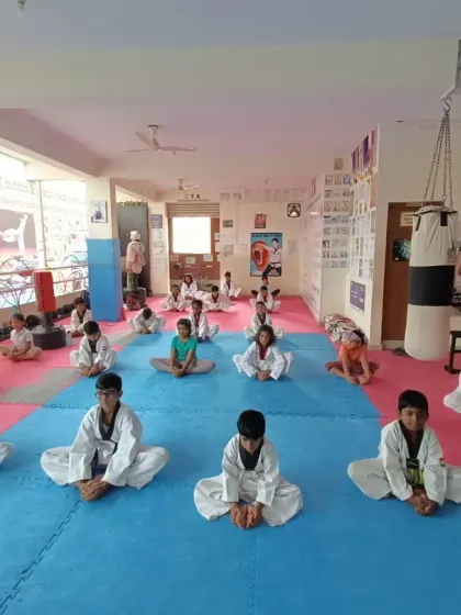 The butterfly stretch is a fundamental part of our warm-up routine.