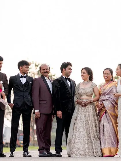 A beautiful family portrait with the newlyweds. Capturing the entire family, from the youngest to the oldest, is an essential part of the wedding story.