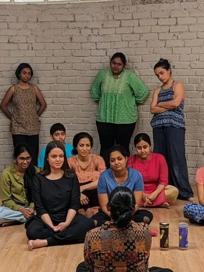 A group photo from one of our intuitive movement workshops. We build a temporary community of trust and shared exploration.