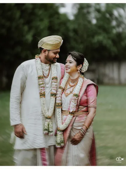 A duplicate of the classic outdoor couple portrait, a must-have for any wedding album.