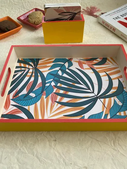 Another shot of the tropical-themed tray, perfect for serving drinks or as a stylish organizer on your coffee table.