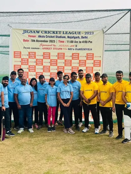 Both teams together at the Aksis Cricket Stadium in Delhi for our annual event.