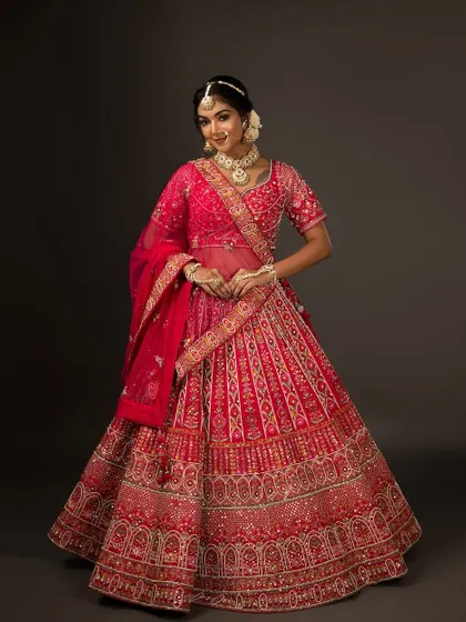 A final full-length shot, showcasing the grandeur of the entire bridal ensemble.