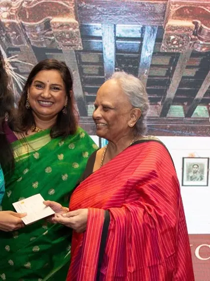 A moment of celebration and recognition at the Tulunadu book launch.