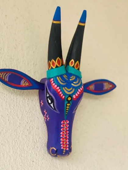 A purple Nandi with delicate pink and gold detailing, showcasing a different color variation of this popular design.
