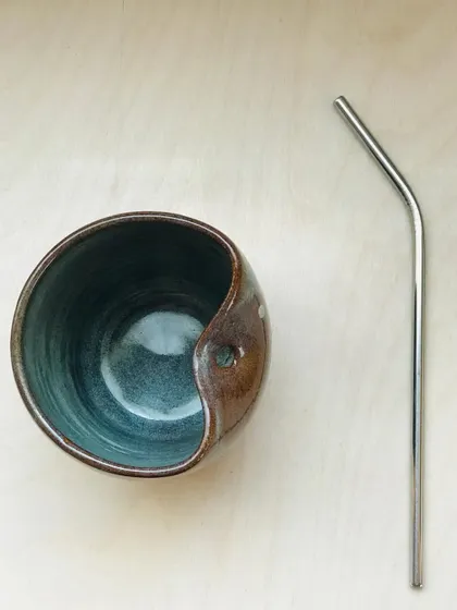 The "Sip Buddy" cup, seen from above. The unique shape and built-in straw holder make it both functional and a great conversation starter.