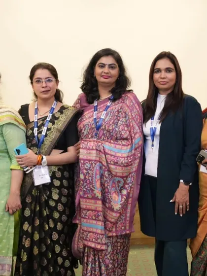 A group photo with other professionals at a conference. Connecting with peers and sharing insights is a vital part of my work. It helps me grow and offer better guidance.