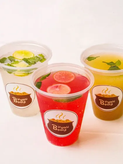 A vibrant trio of Indian summer coolers: kokum, masala lemonade, and aam panna, showcasing a range of beverage options.