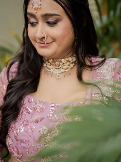 A close-up of the makeup, showing the soft smokey eye and the flawless, dewy skin that looks fresh and natural.