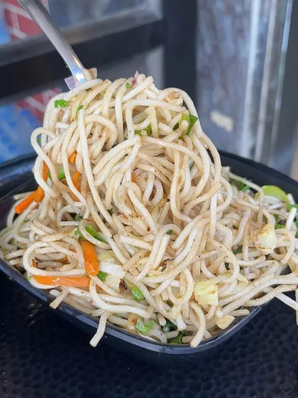 A forkful of my classic Hakka Noodles, a simple and satisfying dish that's always a good choice.