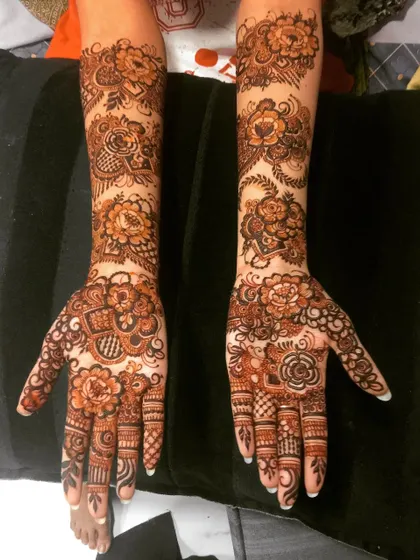 A beautiful floral design with a mix of different flower types and sizes. The pattern is dense and detailed, creating a stunning visual effect.