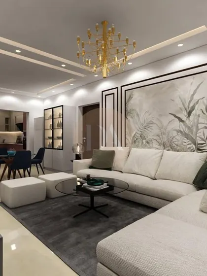 A 3D render of a living room with a neutral L-shaped sofa and elegant wainscoting. The design includes a dining area and crockery unit, demonstrating our skill in creating cohesive, multi-functional spaces.