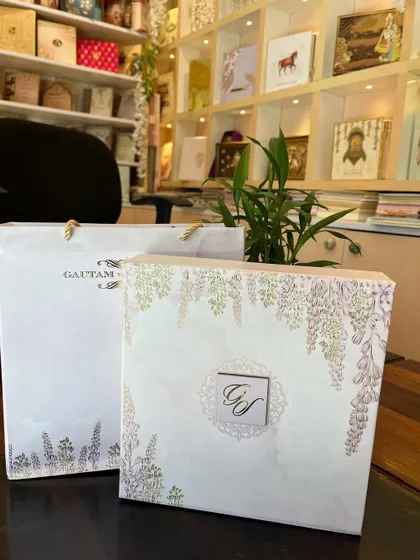 This premium invitation box comes with a matching carry bag. The design features delicate lavender floral illustrations for a soft and romantic feel.