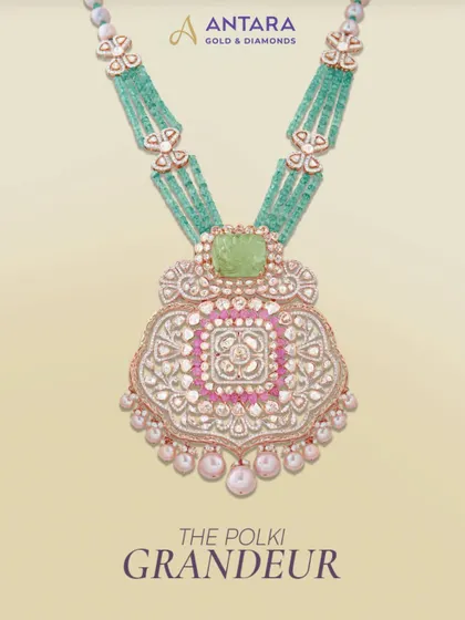 This piece showcases what I call 'Polki Grandeur'. Crafted for moments you’ll cherish, this necklace features an intricate pendant with meenakari work, set against strands of beautiful green beads.